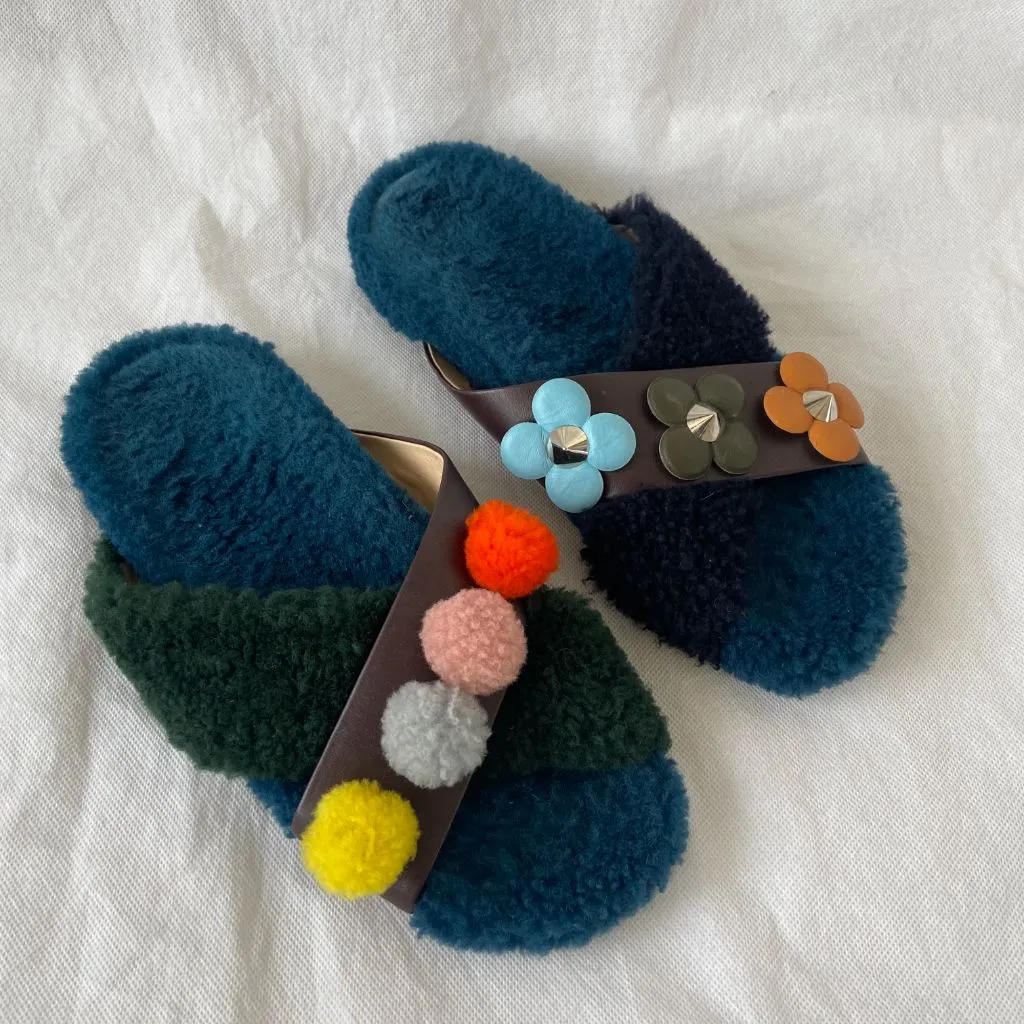 Fendi fur criss cross slides with pom pom embellishments and floral applique, 38