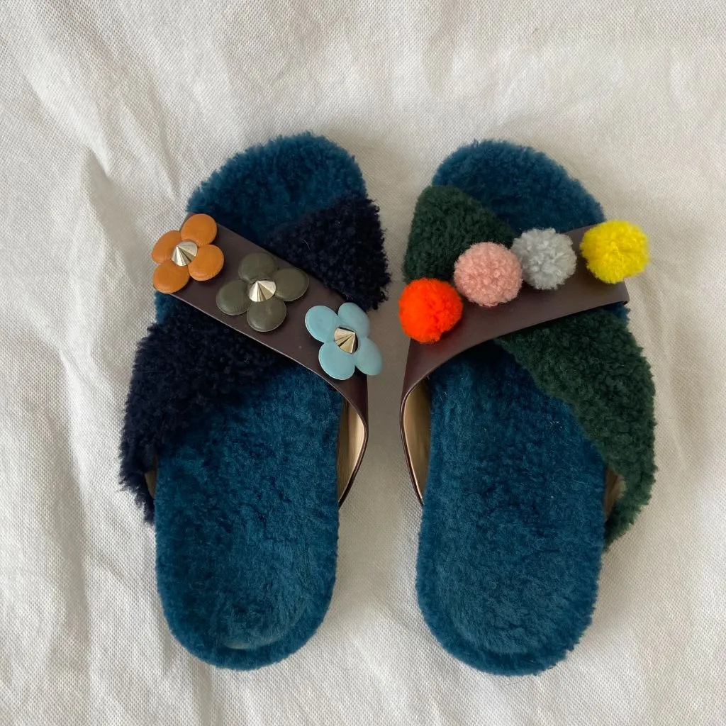 Fendi fur criss cross slides with pom pom embellishments and floral applique, 38